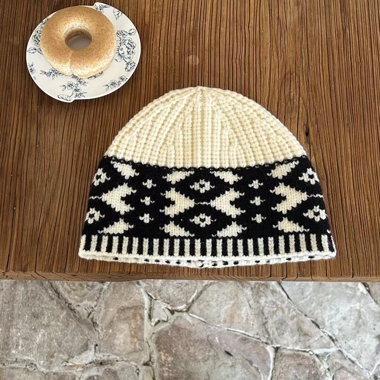 Warm autumn and winter hats for men and women in the street